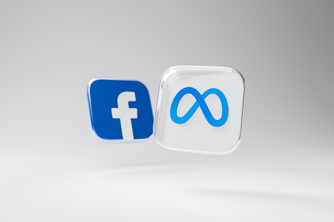 Grafika z logo Facebooka i Mety
